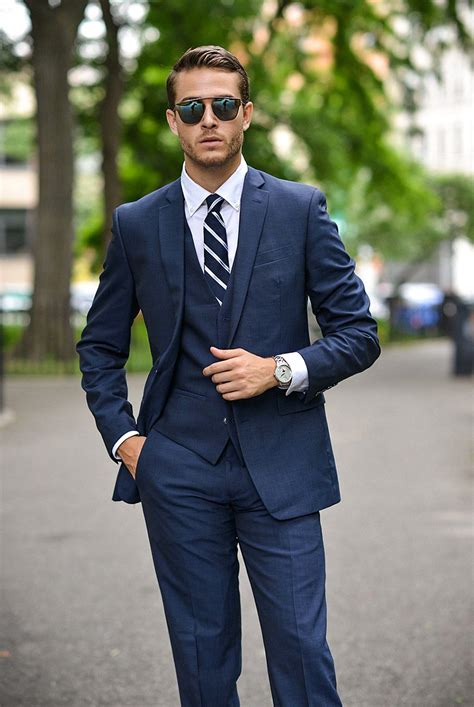 navy blue suit and tie combinations|navy blue suit gold tie.